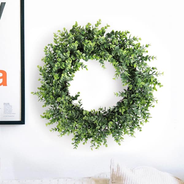 LIVING LUXURY 20 in. Frosted Green Artificial Eucalyptus Leaf Foliage Greenery Wreath with Twig Ring