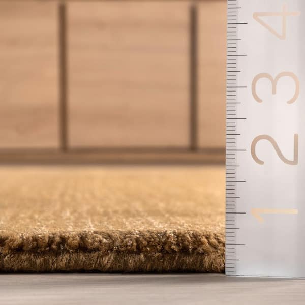 Speckled Wool-Blend Wheat Round 4 ft. Indoor Round Rug