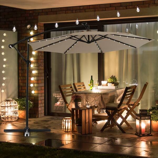 gardenline patio umbrella Backyard Expressions 9ft Solar with 32 LED Lights blocking throughout the day Gardenline Umbrella Pole Light w/4