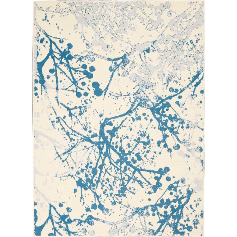 Ivory and Blue Abstract Synthetic 4' x 6' Easy-Care Area Rug