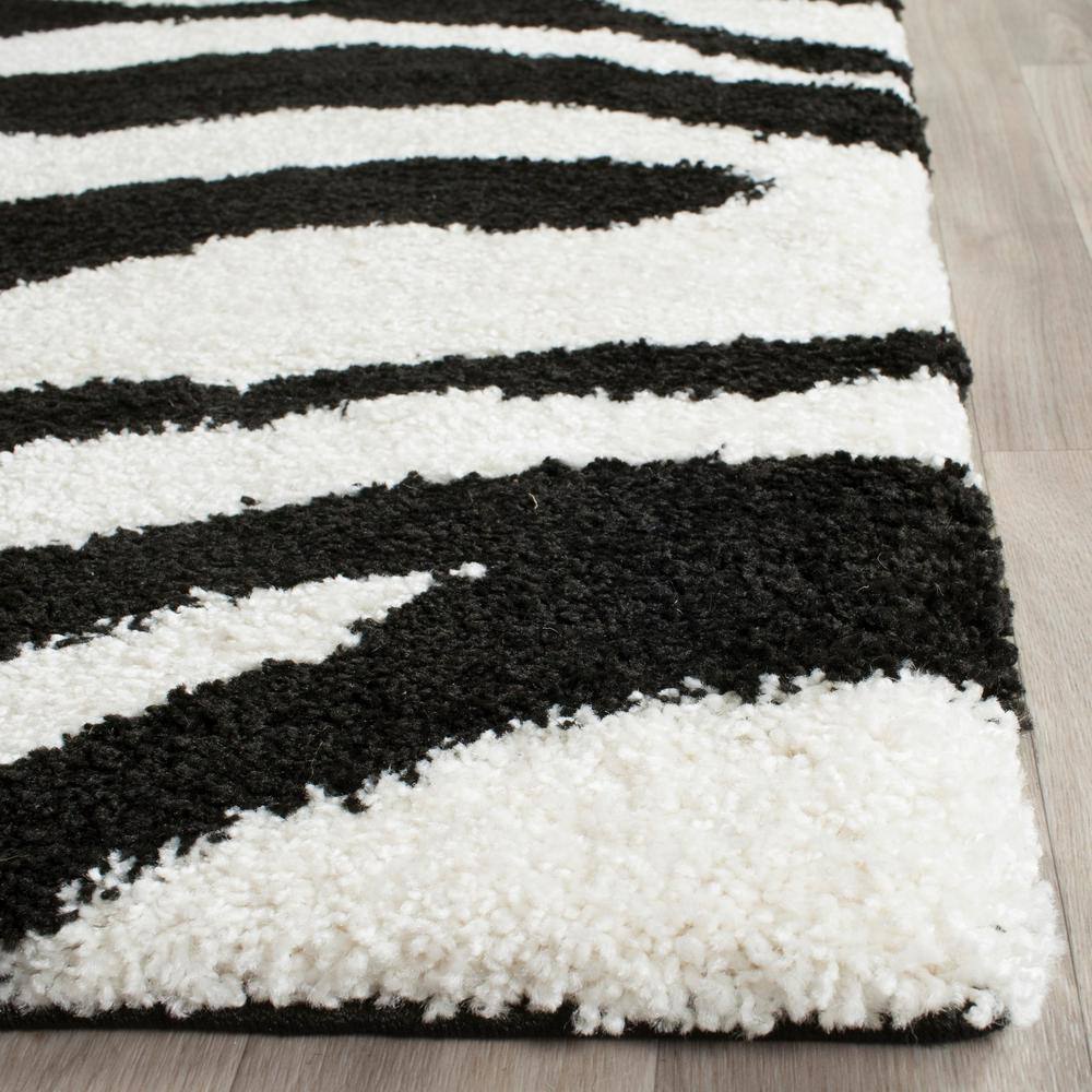 Ivory and Black Zebra Print Shag Area Rug 5'3" x 7'6"