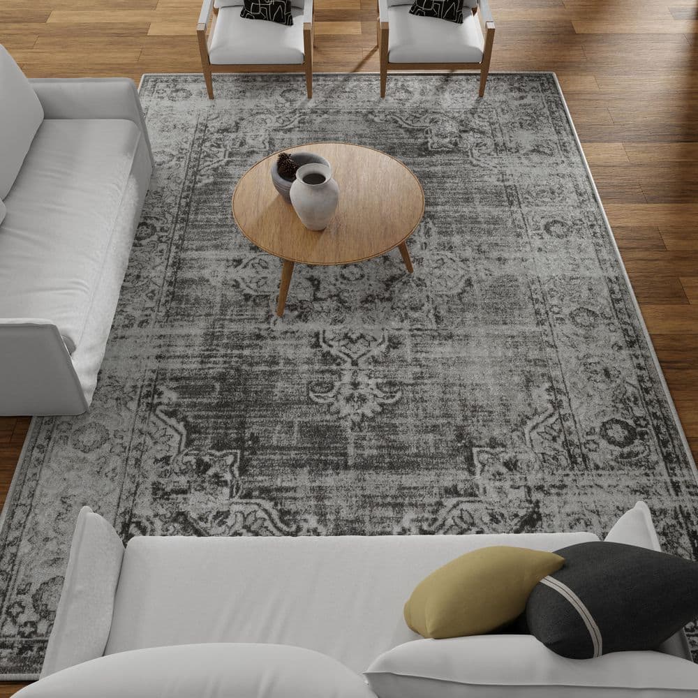 Ivory and Gray 9' x 12' Synthetic Oriental Rug