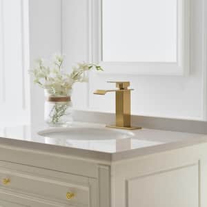 Waterfall Single Hole Single-Handle Low-Arc Bathroom Faucet With Pop-up Drain Assembly in Brushed Gold