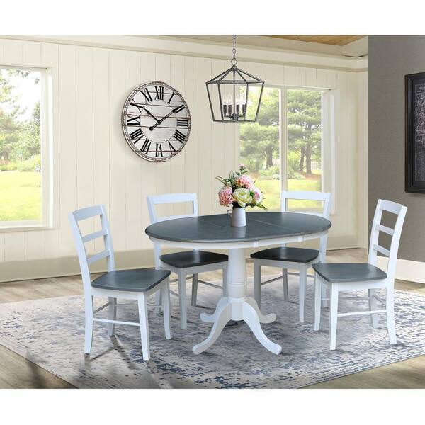 White round extendable outlet dining table and chairs