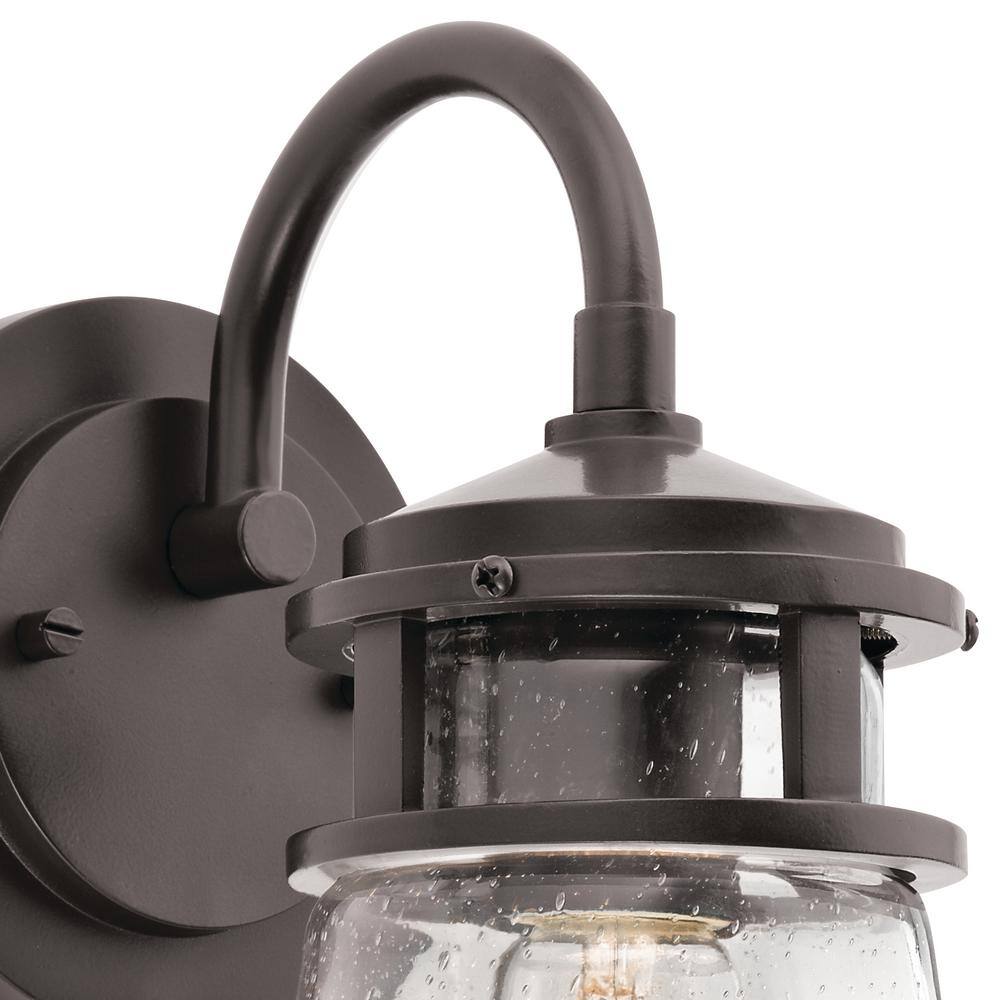 Lyndon 11.25" Bronze and Clear Seeded Glass Wall Sconce
