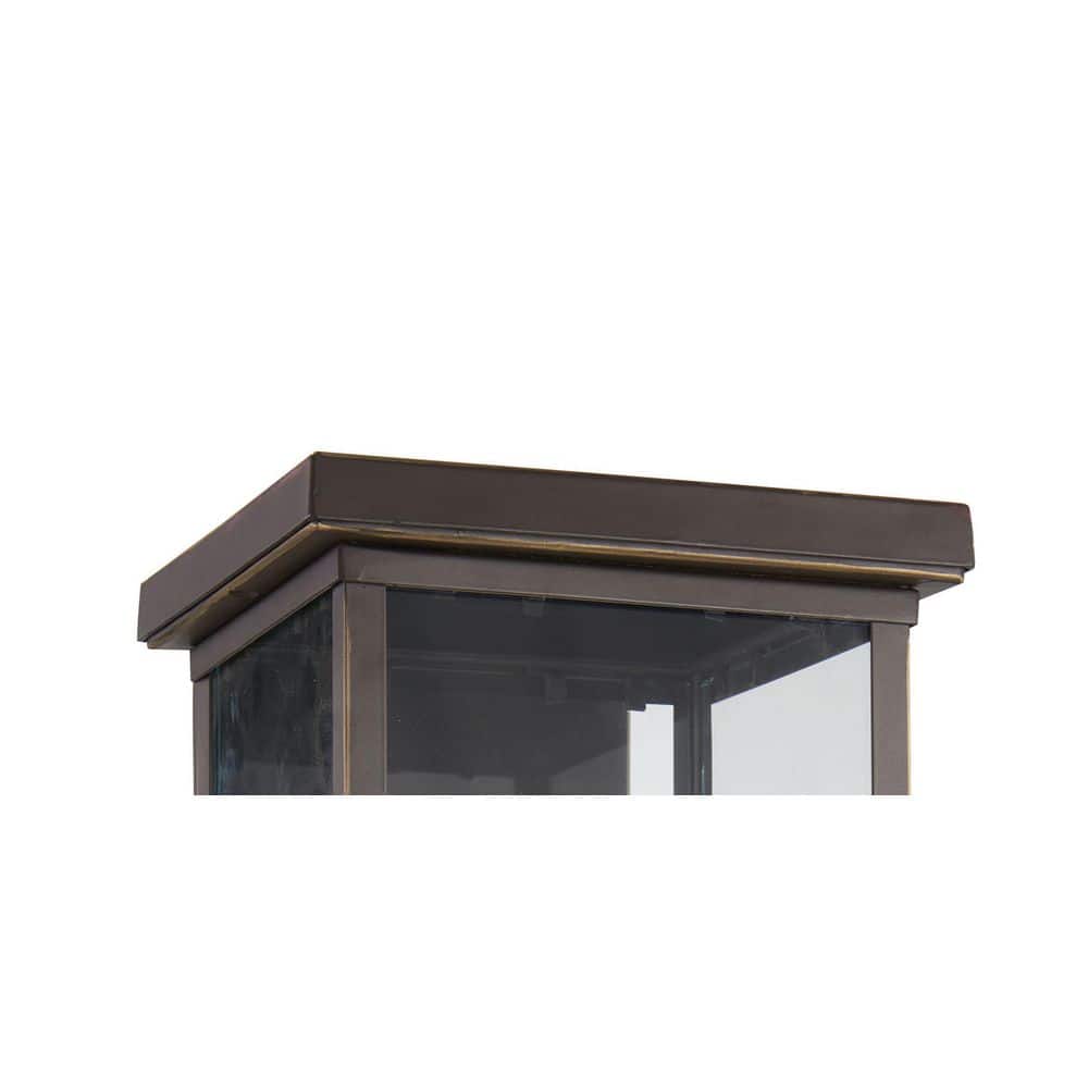 Elegant 4-Light Bronze Wall Lantern with Clear Glass and Gold Highlights