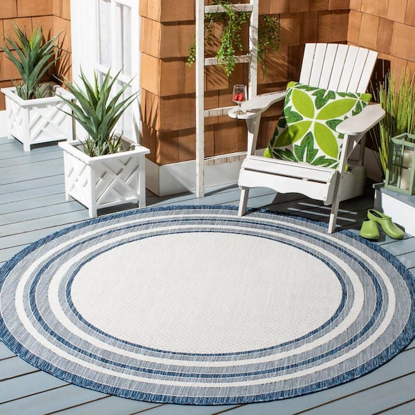 Courtyard Ivory/Navy 8 ft. x 8 ft. Solid Color Striped Indoor/Outdoor Round Area Rug