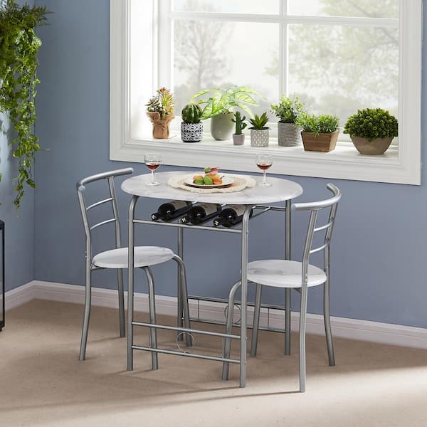 White compact dining table and 2024 chairs