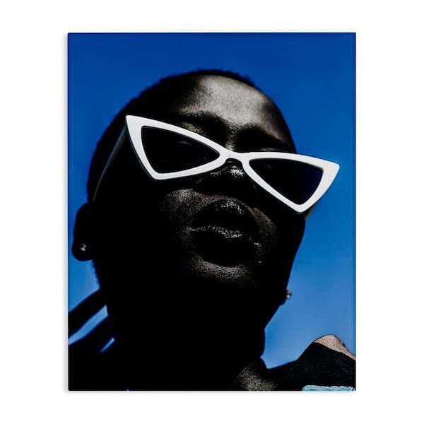 Stupell Industries Stylish Sunglasses on Blue by Oladimeji Odunsi Unframed People Graphic Art Print 48 in. x 36 in.