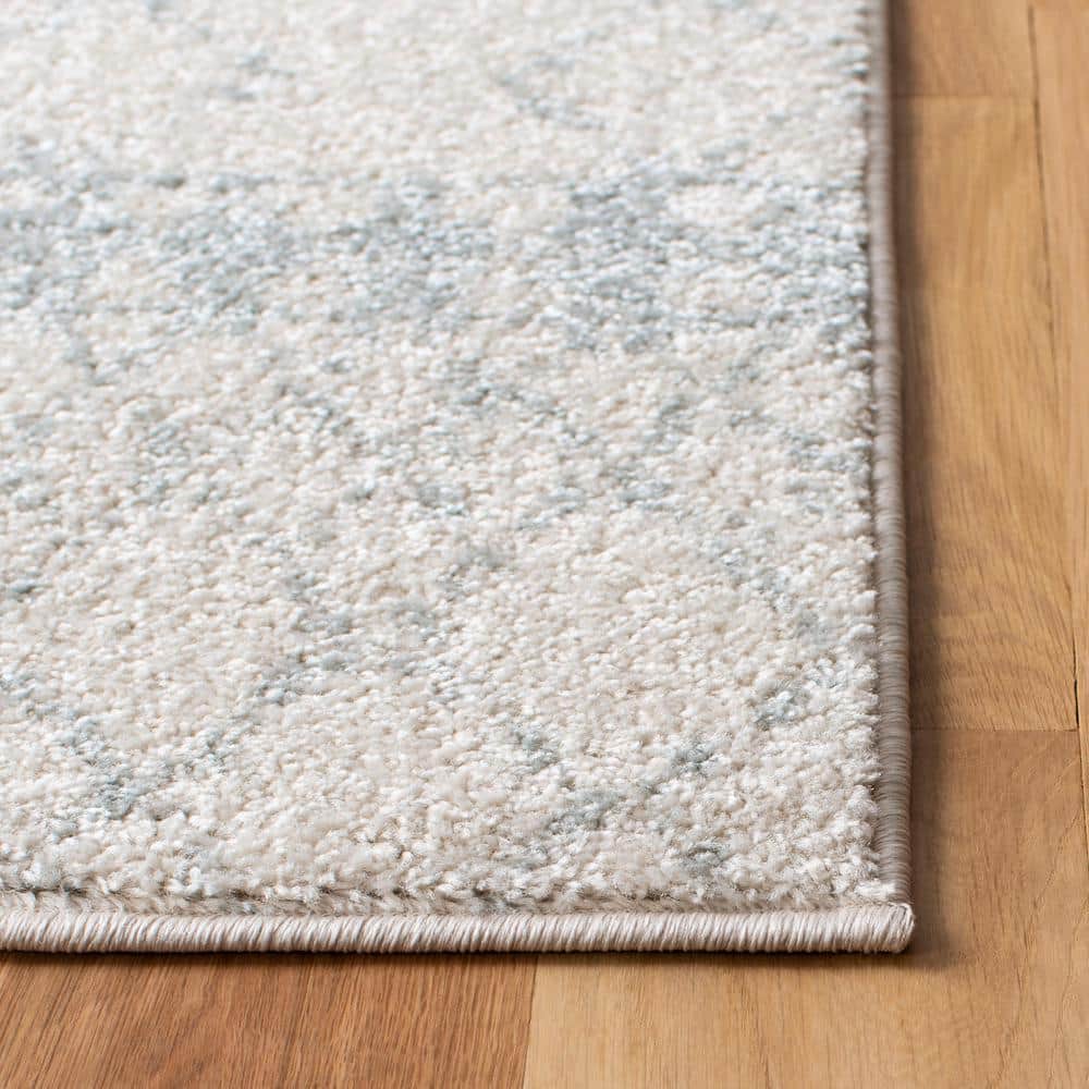 Ivory & Light Grey Reversible Synthetic Area Rug, 9' x 12'