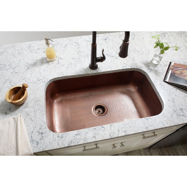 https://images.thdstatic.com/productImages/4a367bf4-2f93-4a58-8add-4c83fdd6299d/svn/antique-copper-sinkology-drop-in-kitchen-sinks-sk101-33ac-e1_600.jpg