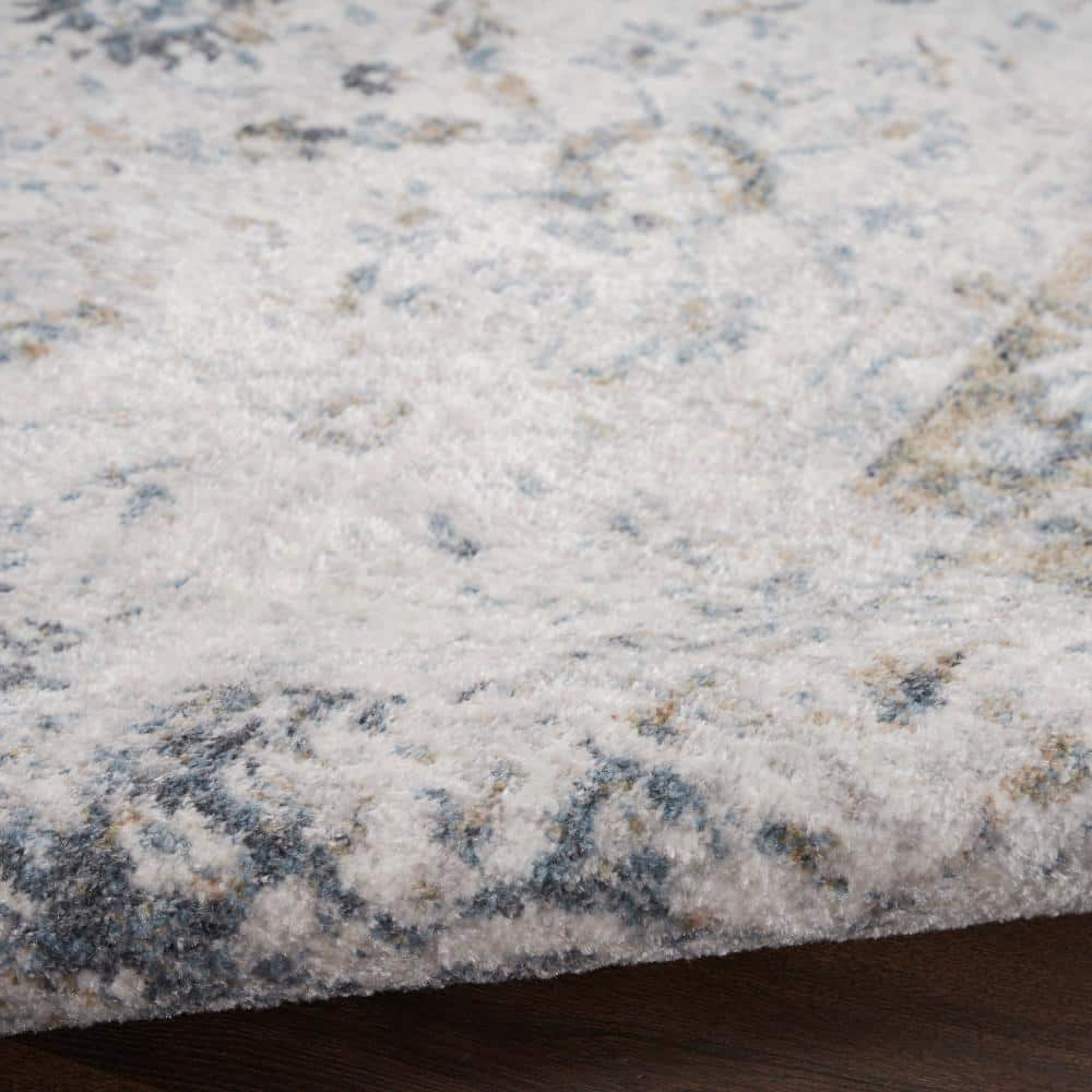 Ivory Blue Floral Synthetic 8' x 10' Washable Rug