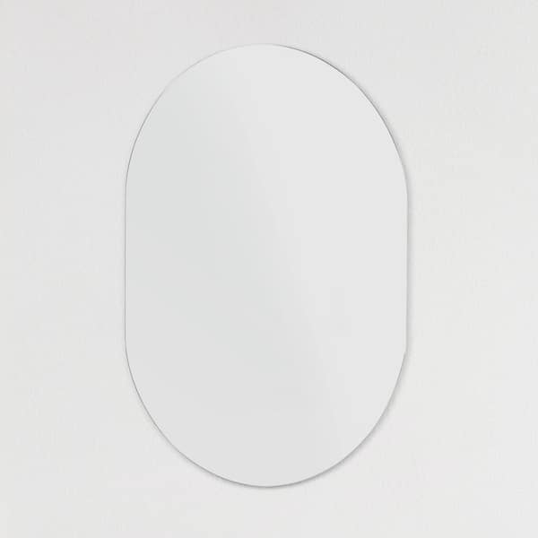 Decor Wonderland Khristy Mini 22 in. W x 28 in. H Oval Frameless Wall Mount Bathroom Vanity Mirror with Polished Edge
