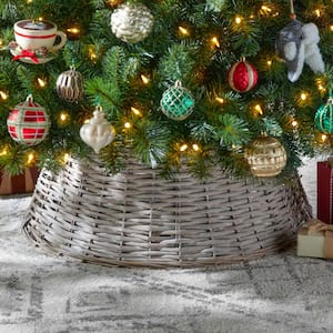 https://images.thdstatic.com/productImages/4a9219ee-1a85-440e-8a5c-a35b4208a2d1/svn/home-accents-holiday-christmas-tree-collars-4040583-e4_300.jpg