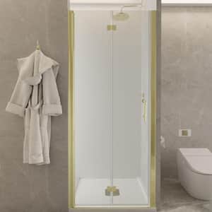 32-33 in. W x 72 in. H Bi-Fold Frameless Shower Door in Brushed Gold with Clear Glass