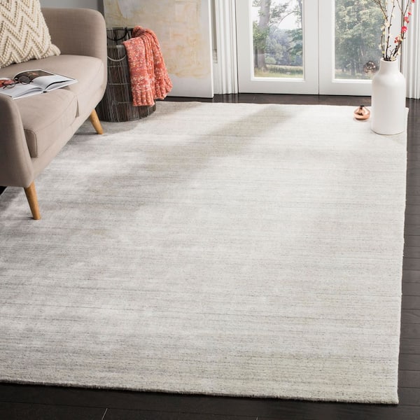 Mirage 6 ft. x 9 ft. Silver Solid Color Area Rug