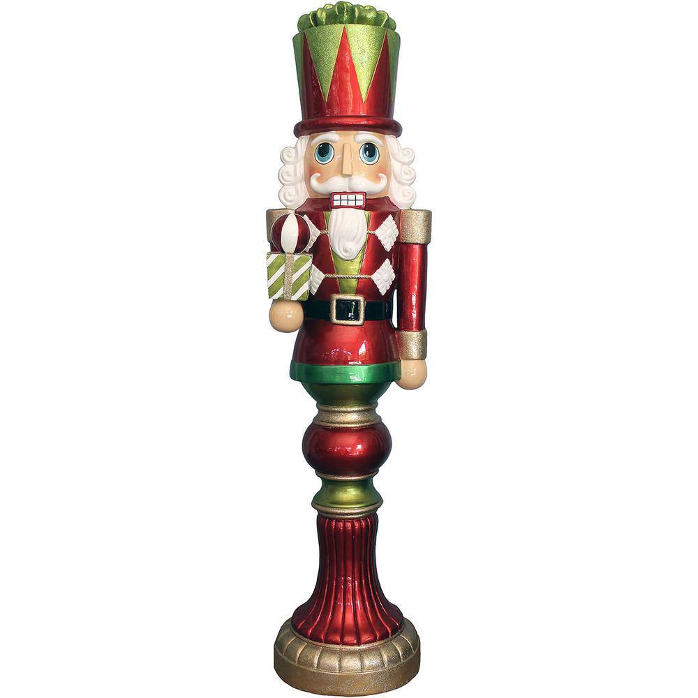 4 ft. Christmas Candy-Look Nutcracker Greeter Holding Gift in Red