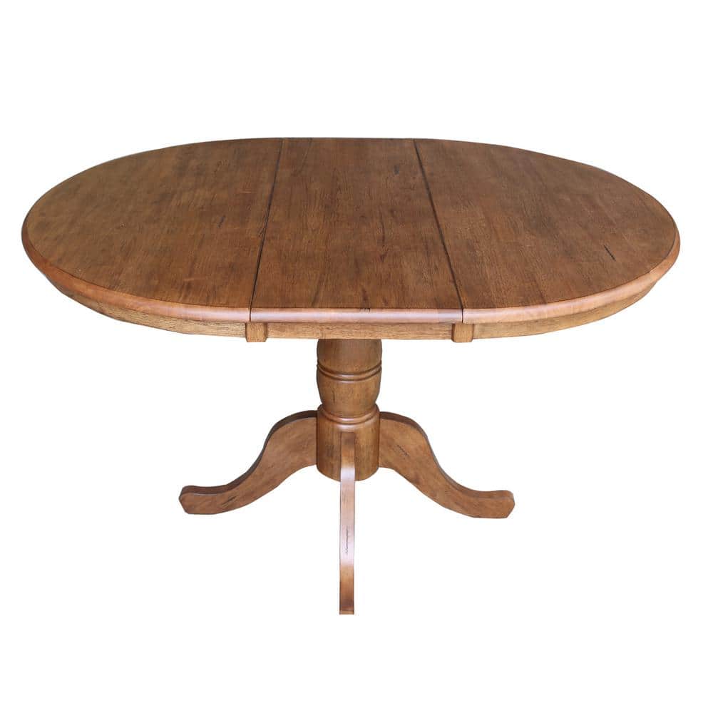 Elegant Round Oak Extendable Dining Table with Drop Leaf