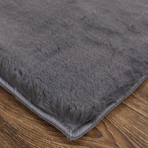 3 X 5 Black and Taupe Solid Color Area Rug