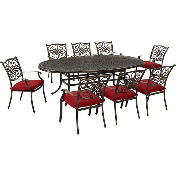 Hanover Traditions 9-Piece Aluminum Outdoor Dining Set with Red Cushions, 8 Stationary Chairs and Oval Cast Table