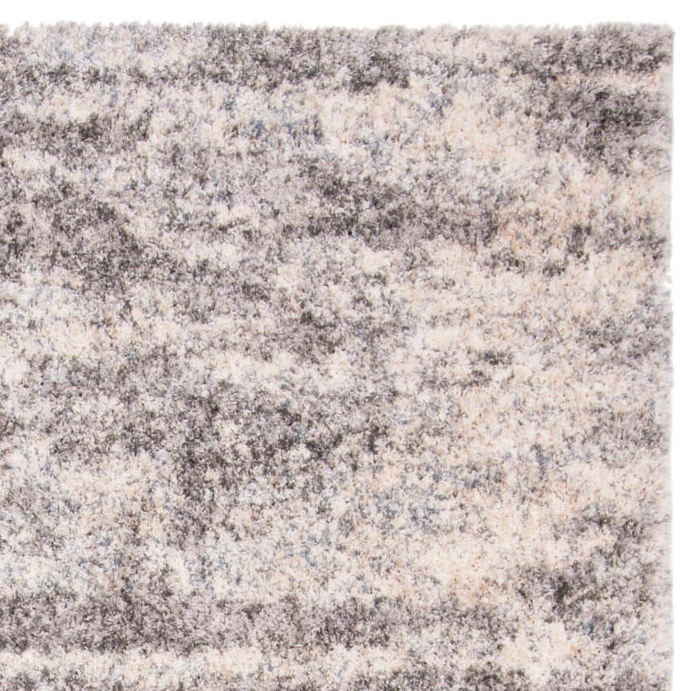 Gray and Cream 9' x 12' Synthetic Shag Area Rug