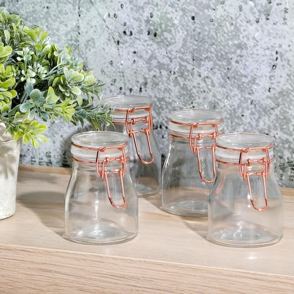 https://images.thdstatic.com/productImages/4b1065c0-884b-4e69-98b1-3b6341dc8edf/svn/clear-with-rose-gold-gibson-home-food-storage-containers-985119201m-76_600.jpg