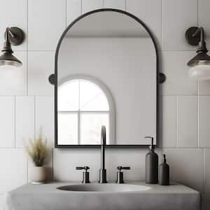 24 in. W x 36 in. H Arched Metal Framed Pivoted Bathroom Wall Vanity Mirror in Black