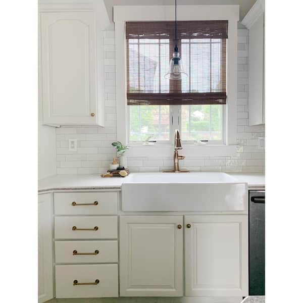 https://images.thdstatic.com/productImages/4b1a77b5-6703-44f1-a5e8-3f3cbd0c53d3/svn/crisp-white-sinkology-farmhouse-kitchen-sinks-sk450-34fc-31_600.jpg