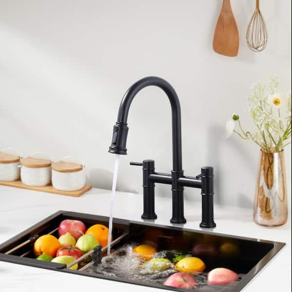 Double Handle Pull-Down High Arc Bridge Kitchen Faucet with Brass and Stainless Steel in Matte Black