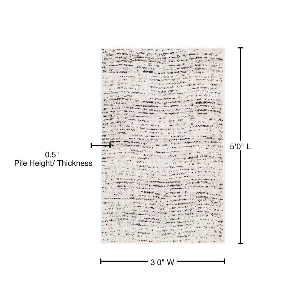 Ivory and Silver Synthetic 3' x 5' Reversible Area Rug