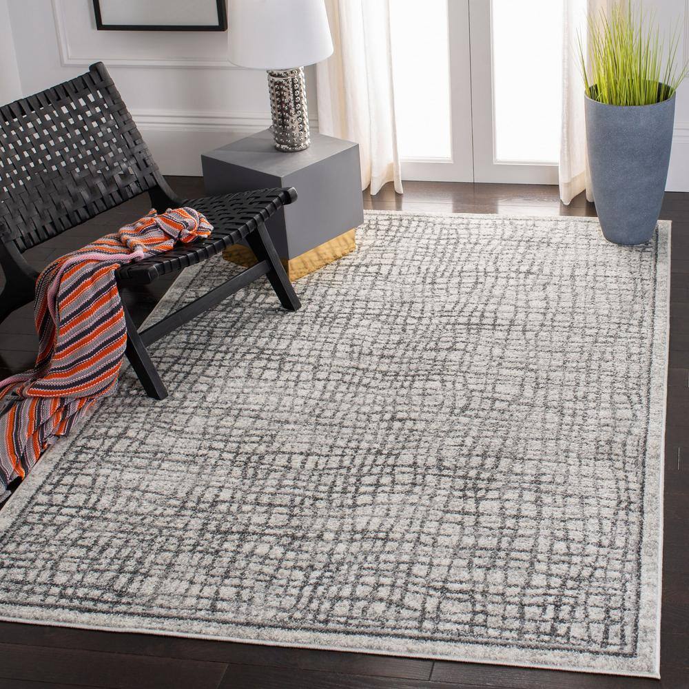 Ivory and Silver Rectangular Synthetic Area Rug, 6' x 9'