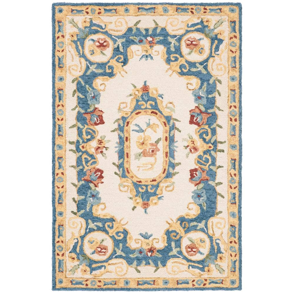 Handmade Cream and Blue Floral Wool Area Rug