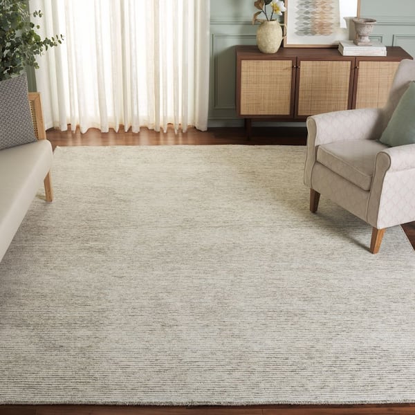 Ebony 6 ft. x 9 ft. Green/Ivory Solid Color Area Rug