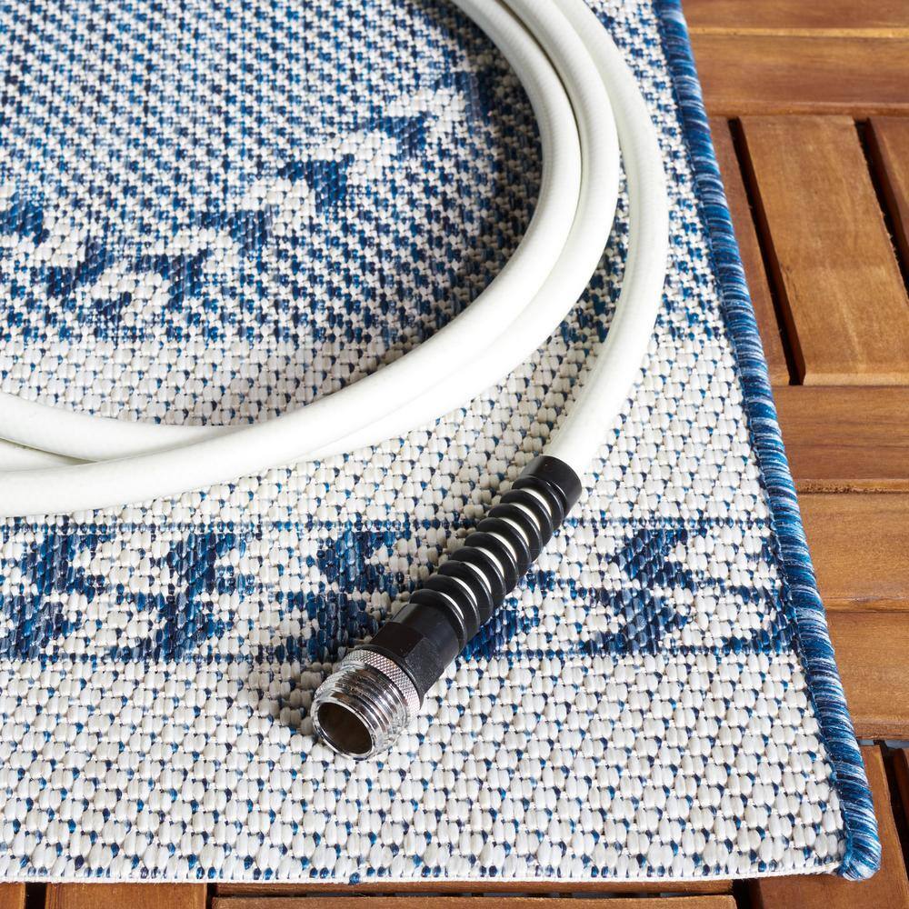 Navy and Ivory Rectangular Synthetic Area Rug