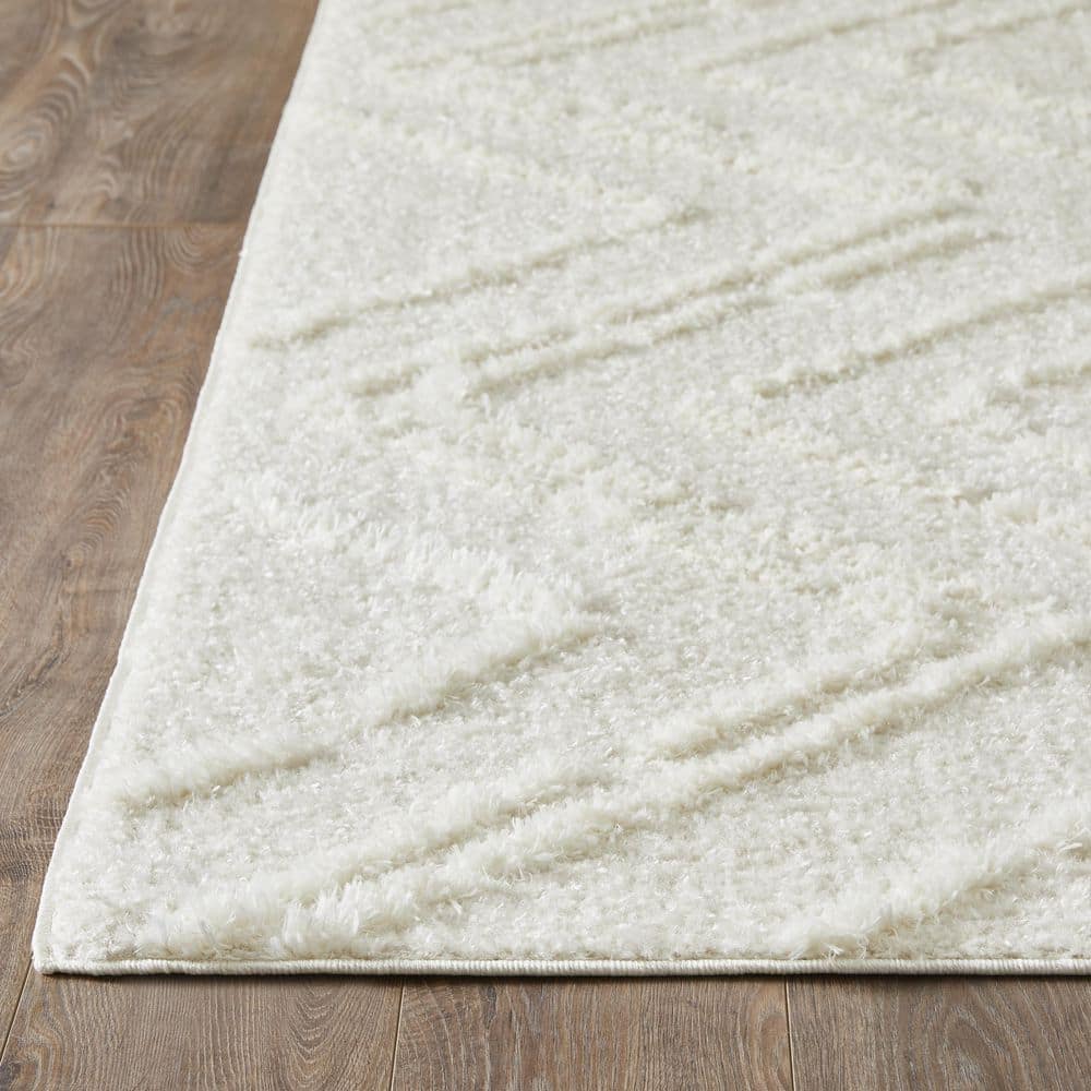 Cream 9' x 12' Stain-Resistant Synthetic Area Rug