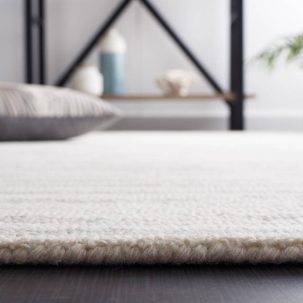 Handmade Abstract Ivory and Light Blue Wool Area Rug, 4' x 6'