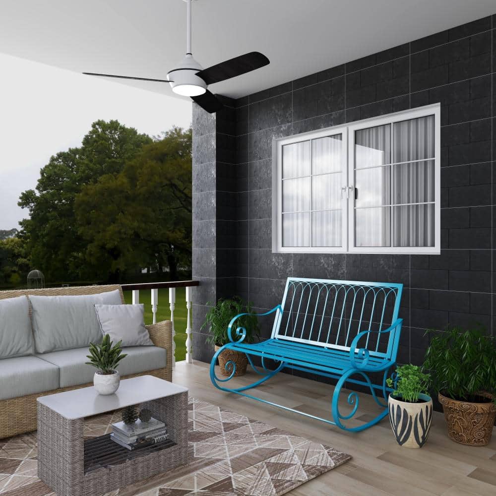 Teal Metal Rocking Outdoor Bench with Scrolled Armrests