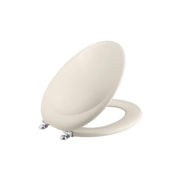 KOHLER Revival Elongated Closed Front Toilet Seat with Brushed Chrome Hinges in Biscuit Satin-DISCONTINUED