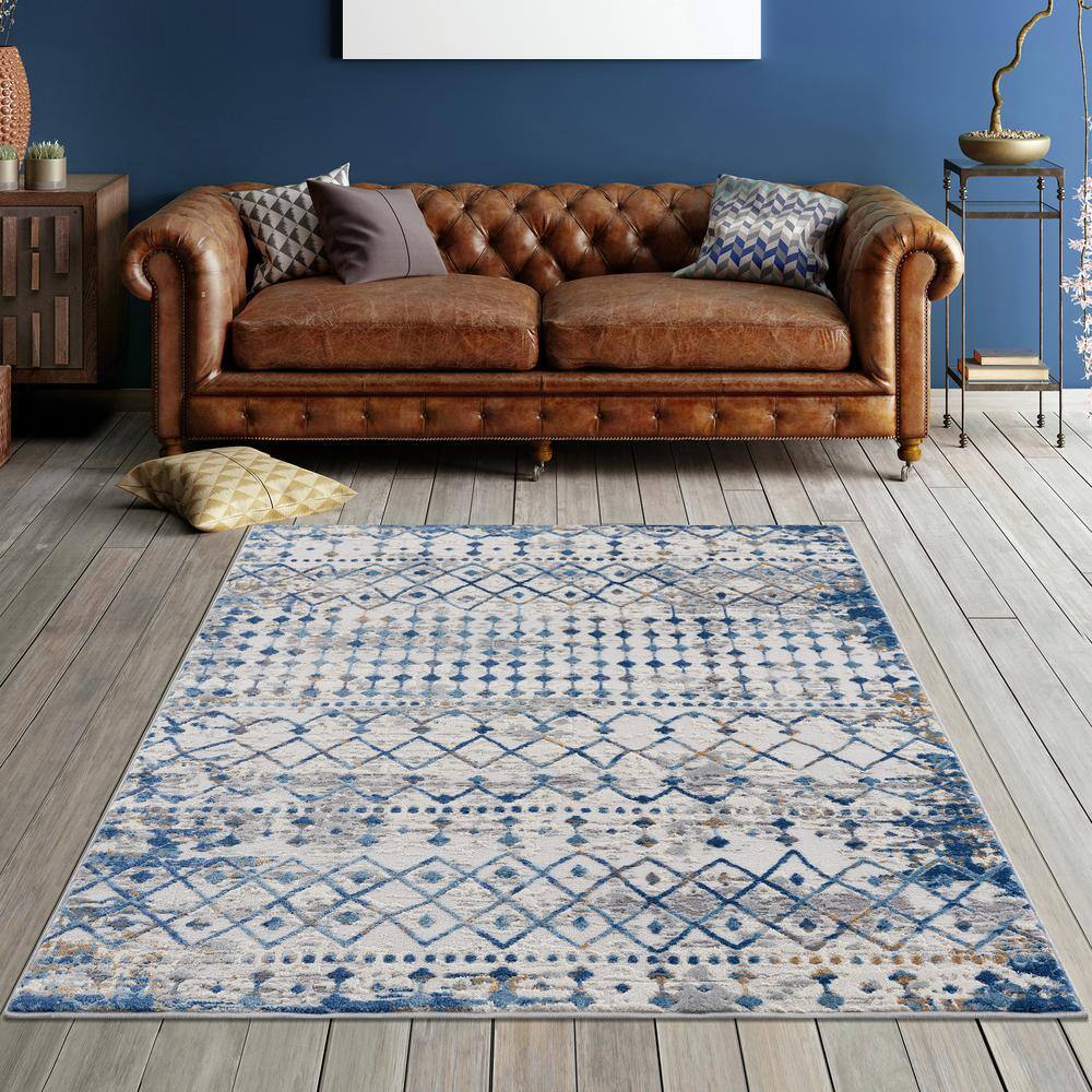 Gold and Cream Rectangular 6' x 9' Easy Care Synthetic Area Rug