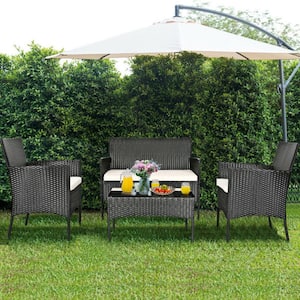 4-Piece Patio Metal Rattan Conversation Set with Tempered Glass Top Coffee Table & Seat Cushions in White