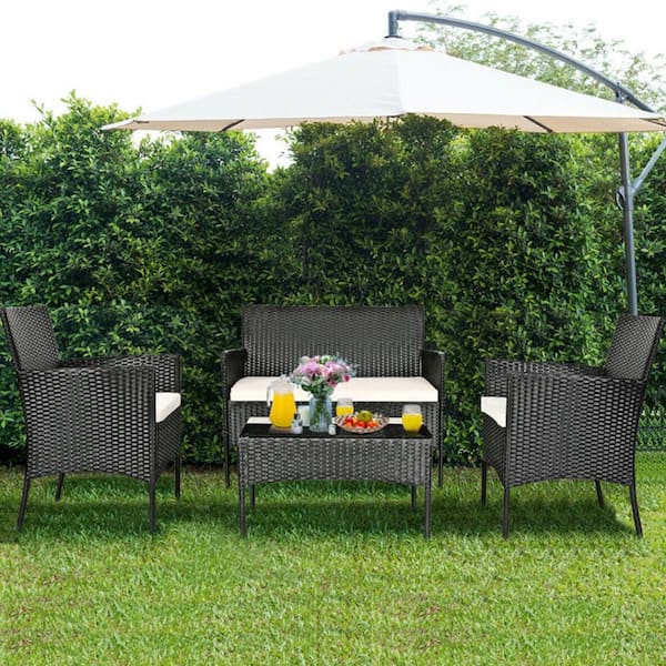 4-Piece Patio Metal Rattan Conversation Set with Tempered Glass Top Coffee Table & Seat Cushions in White