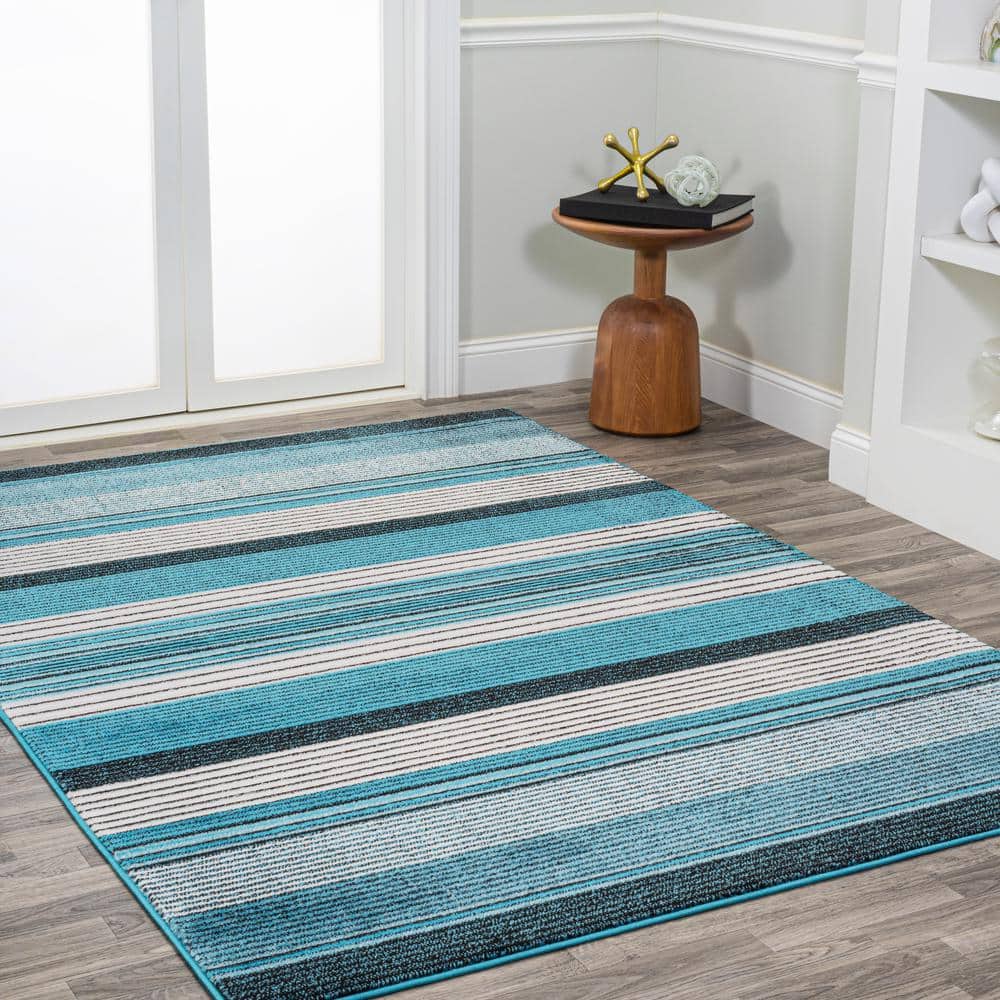 5' x 8' Blue and Navy Gradient Striped Synthetic Area Rug