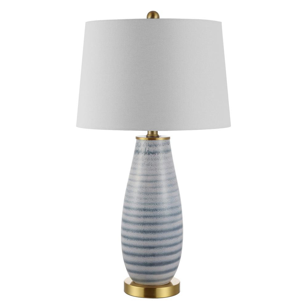 https://images.thdstatic.com/productImages/4bca8959-99f6-48ab-bfdf-d6297cd0a9a9/svn/blue-safavieh-table-lamps-tbl4278a-64_1000.jpg