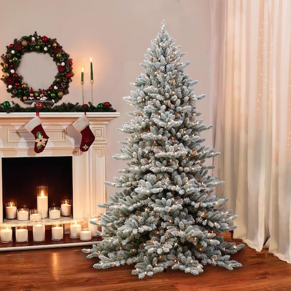 7.5 ft. Prelit Royal Majestic Fraser Fir Flocked Green Tree with 600 Prelit Lights and Memory Tips and Sure-Lit Pole