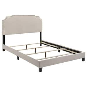 Tamarac Beige Wood Frame Queen Panel Bed with Nail Head Trim