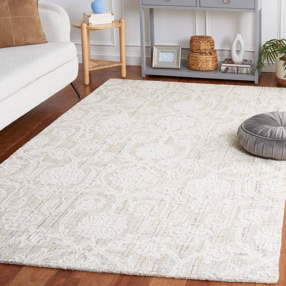 Ivory Wool 8' x 10' Handmade Tufted Area Rug