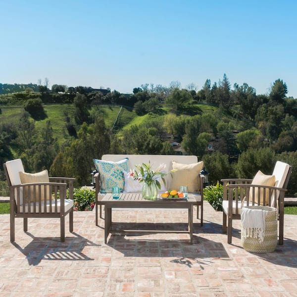 Zeus & Ruta Gray 4-Piece Wood Patio Conversation Set with Acacia Wood Table and Cream Cushions