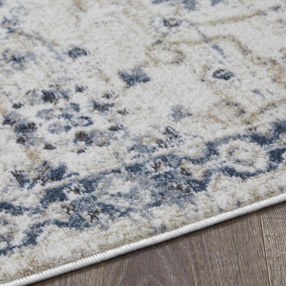 Kehleigh Aylesh 9' x 12' Blue and Cream Synthetic Area Rug