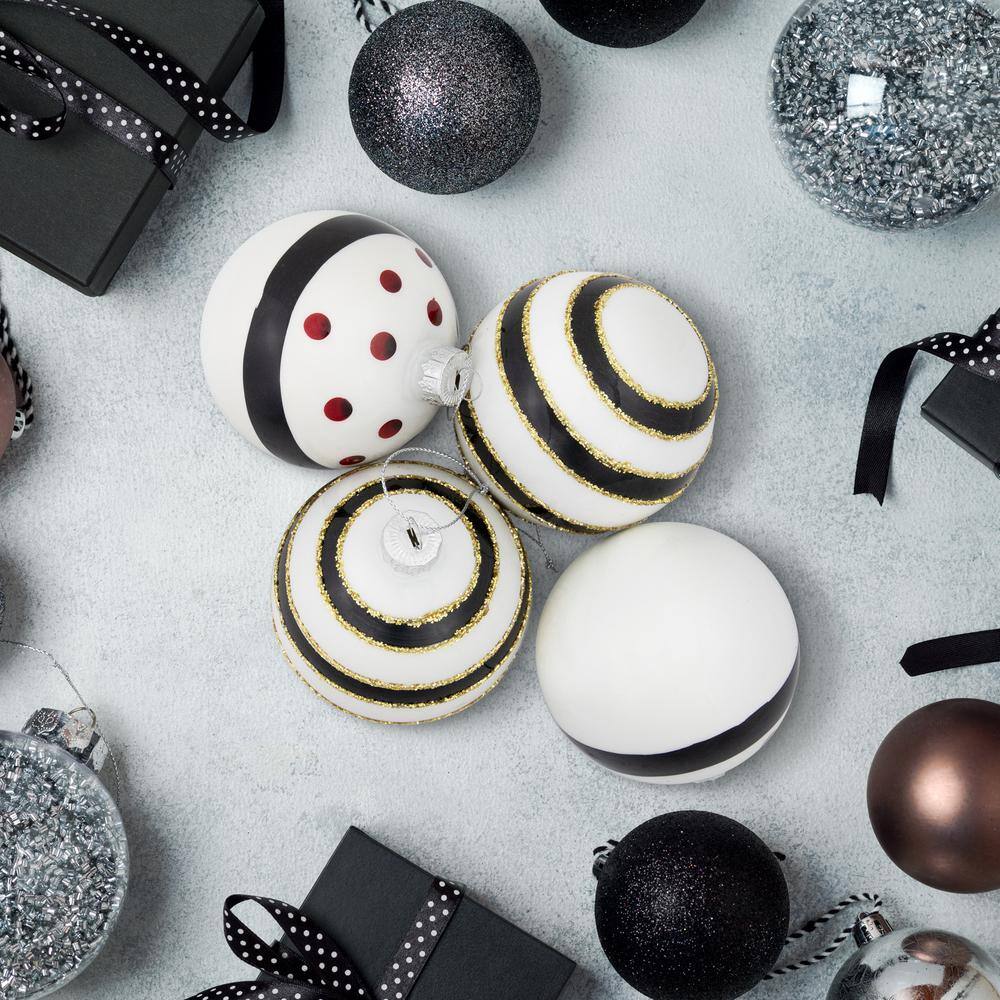 Set of 4 White and Black Striped Glass Christmas Ornaments with Gold Accents