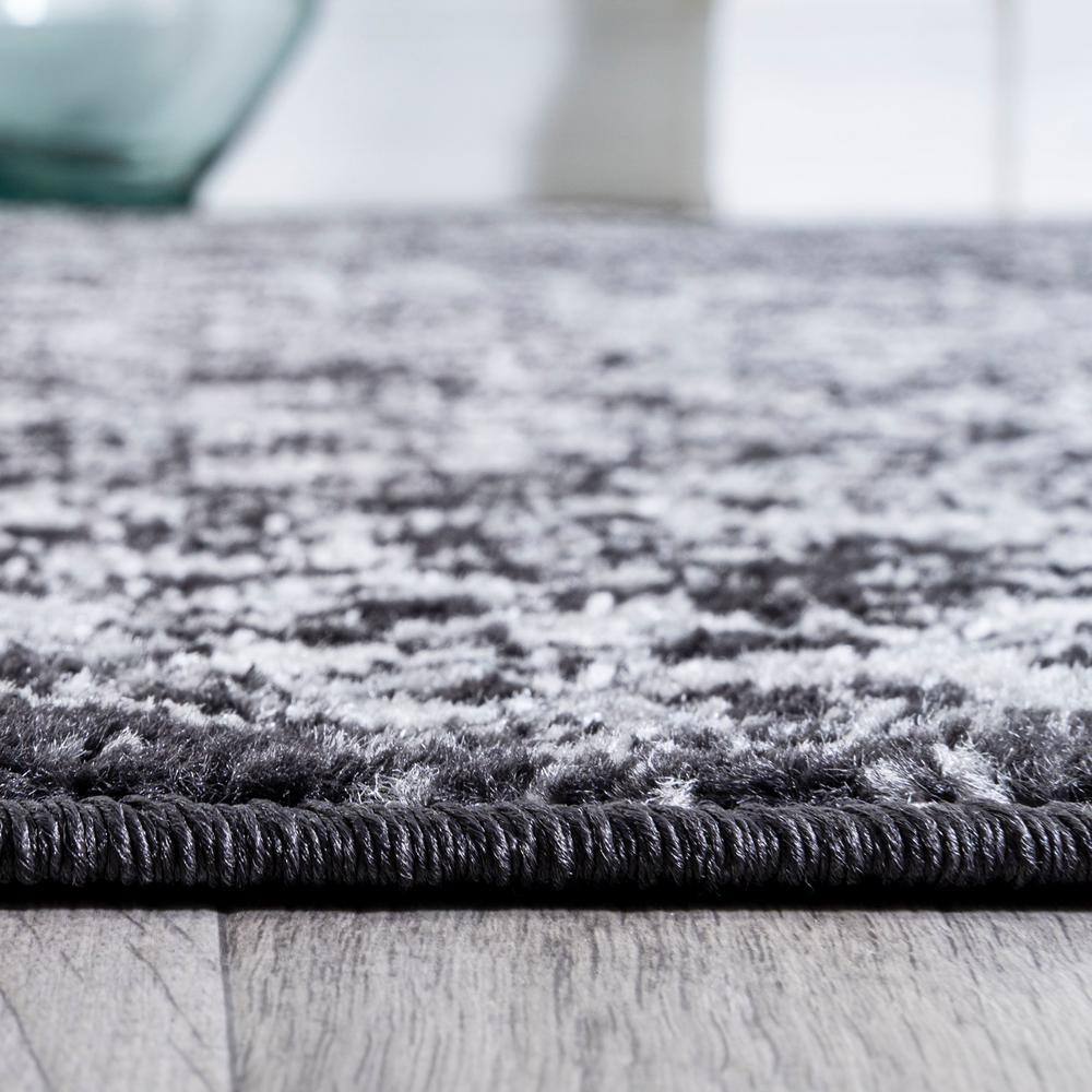 Bohemian Bliss Black/Ivory Synthetic 8' x 10' Easy-Care Area Rug